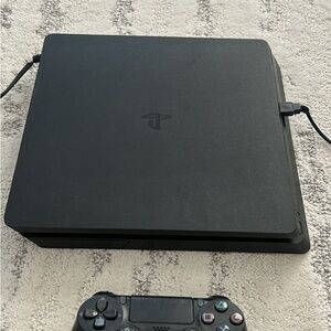 Sony PlayStation Slim Console with Black Controller